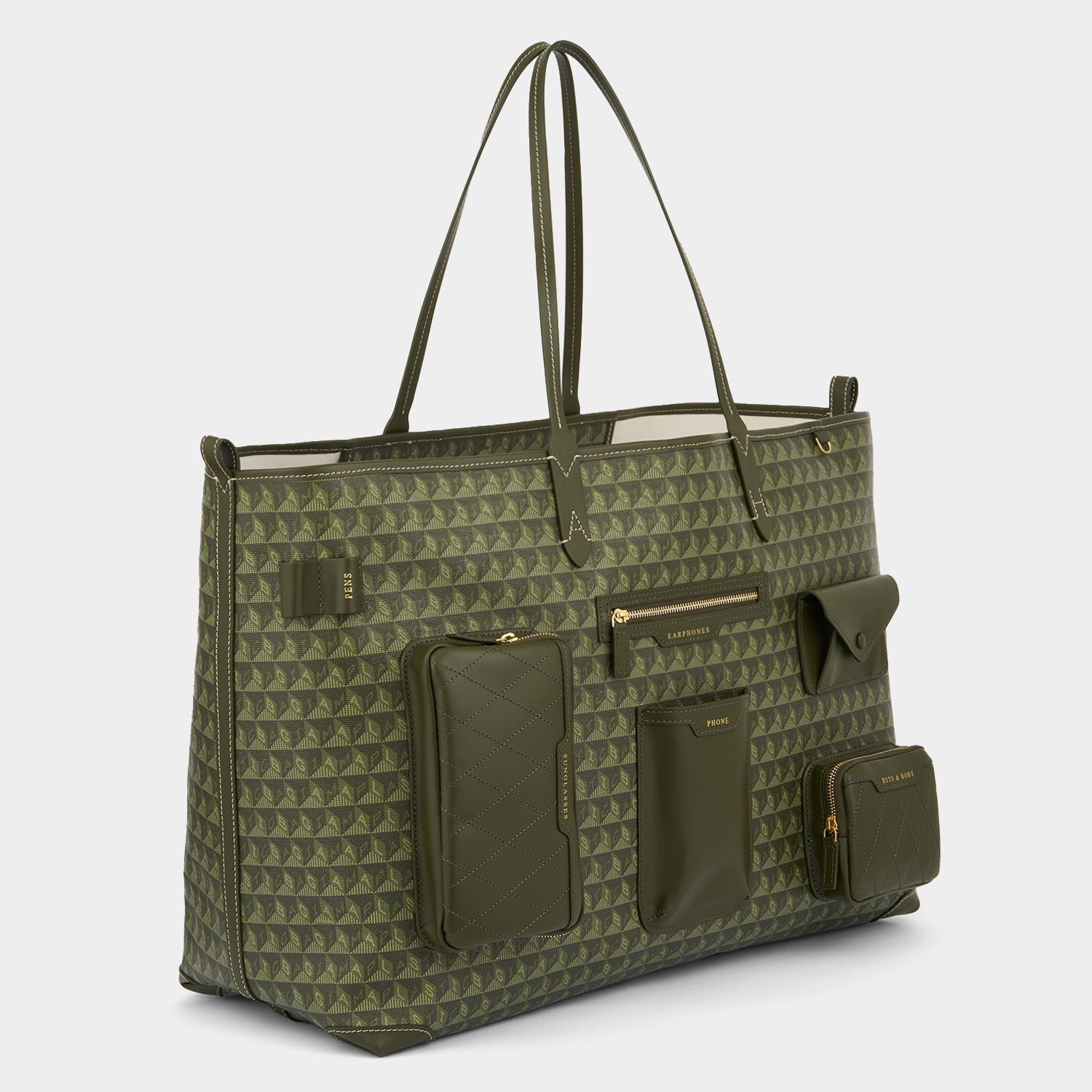 「I AM A Plastic Bag」 XL マルチポケット トート -

                  
                    Recycled Coated Canvas in Fern -
                  

                  Anya Hindmarch JP

