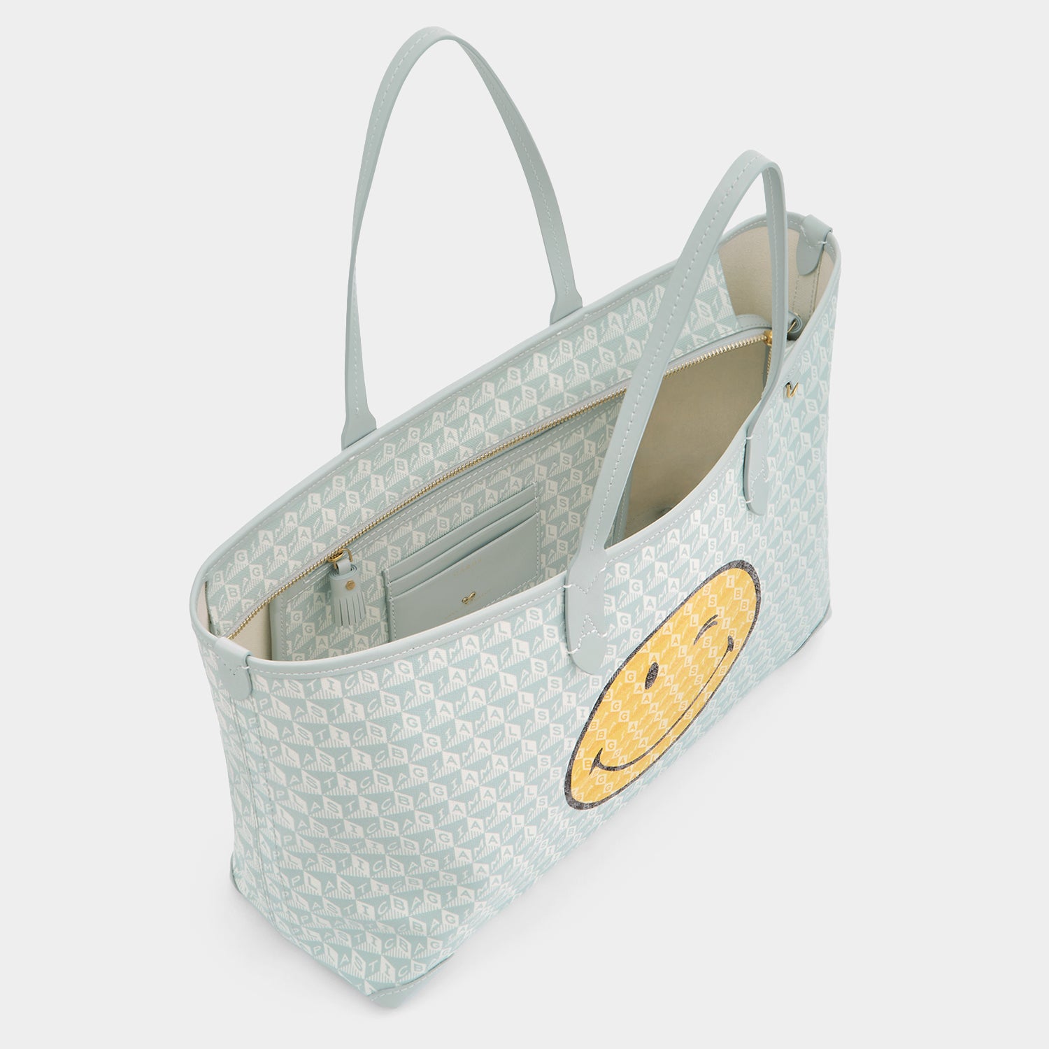 I AM A Plastic Bag」ウィンク・ジップ・トート | Anya Hindmarch JP