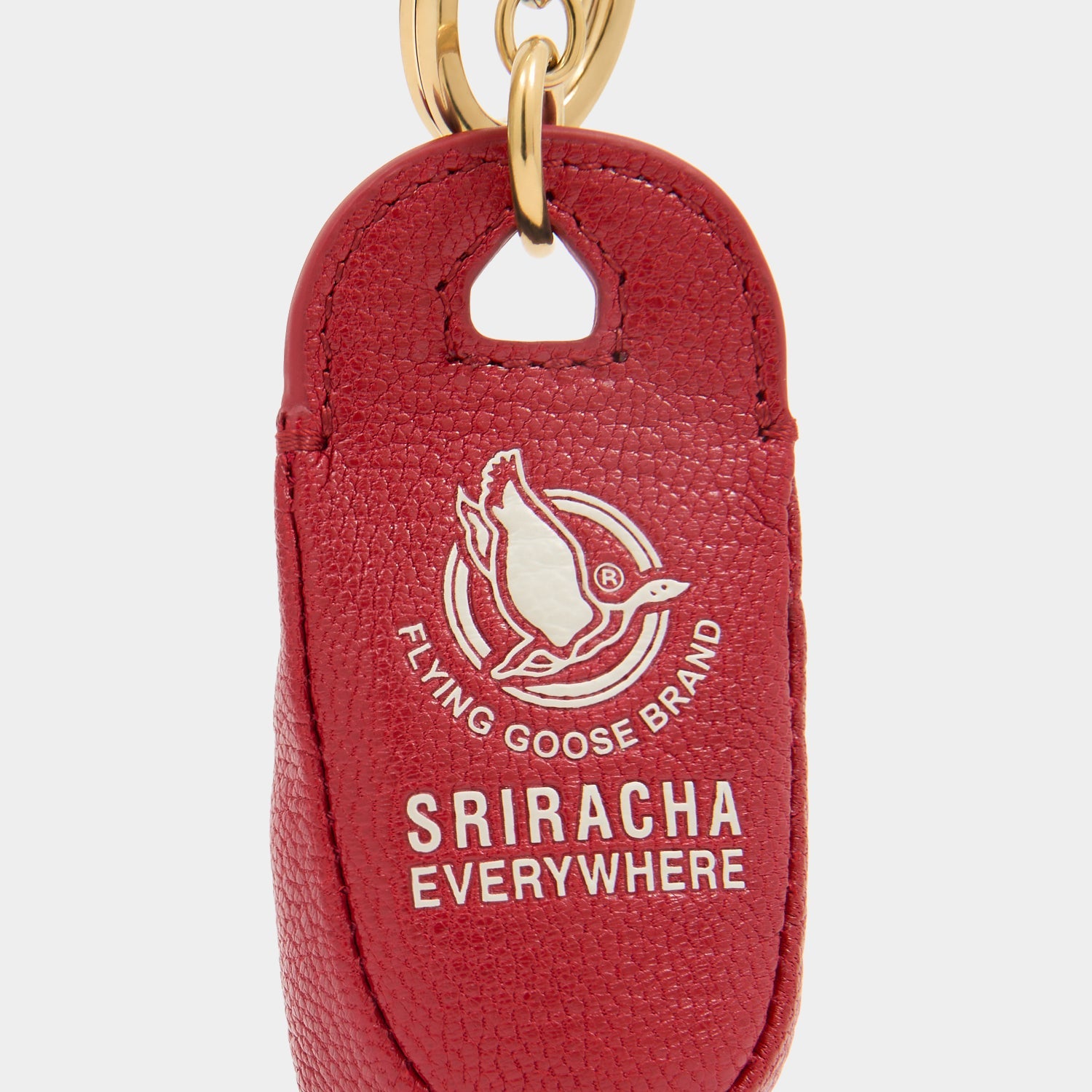 Flying Goose Sriracha」チャーム | Anya Hindmarch JP Flying Goose Sriracha」チャーム | Anya Hindmarch JP