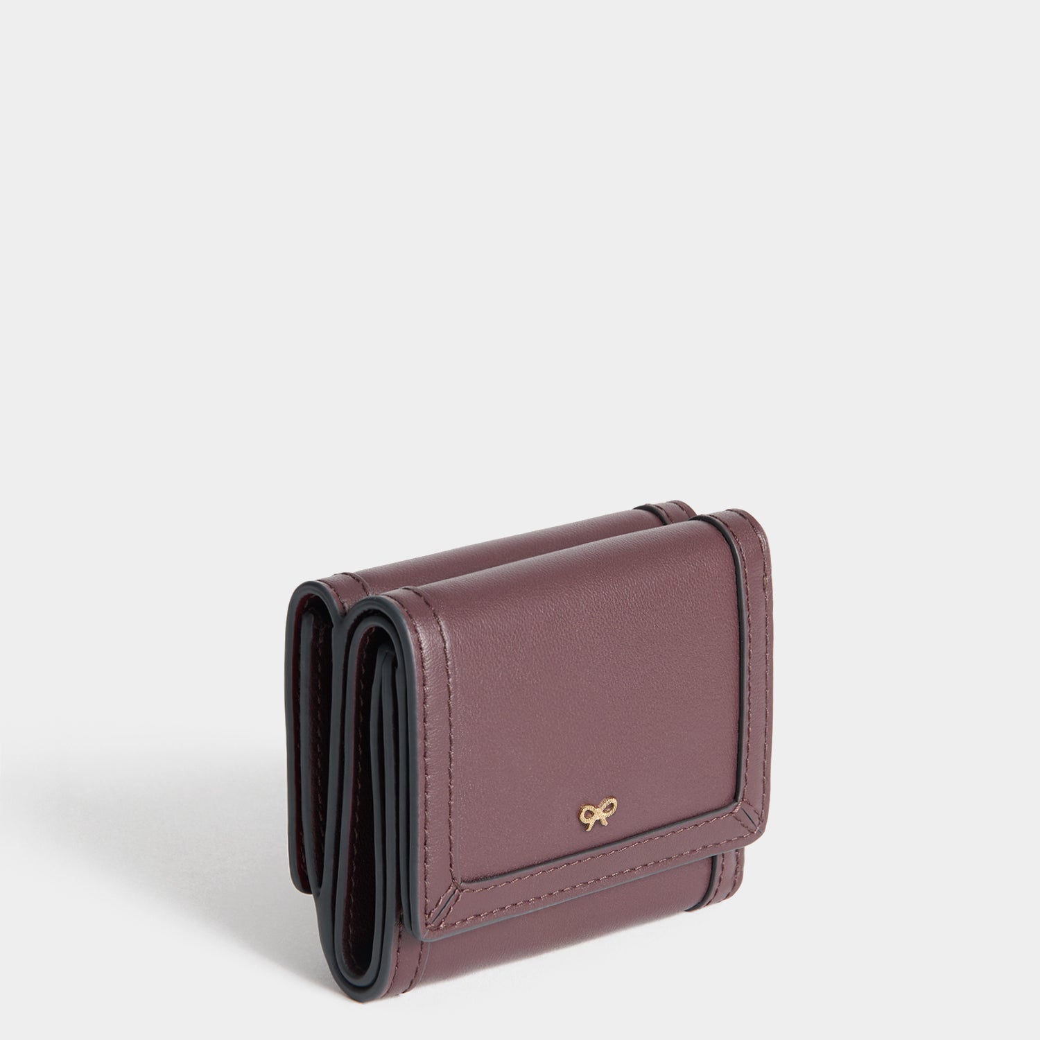 Border」ミニ・トライフォルド・ウォレット | Anya Hindmarch JP