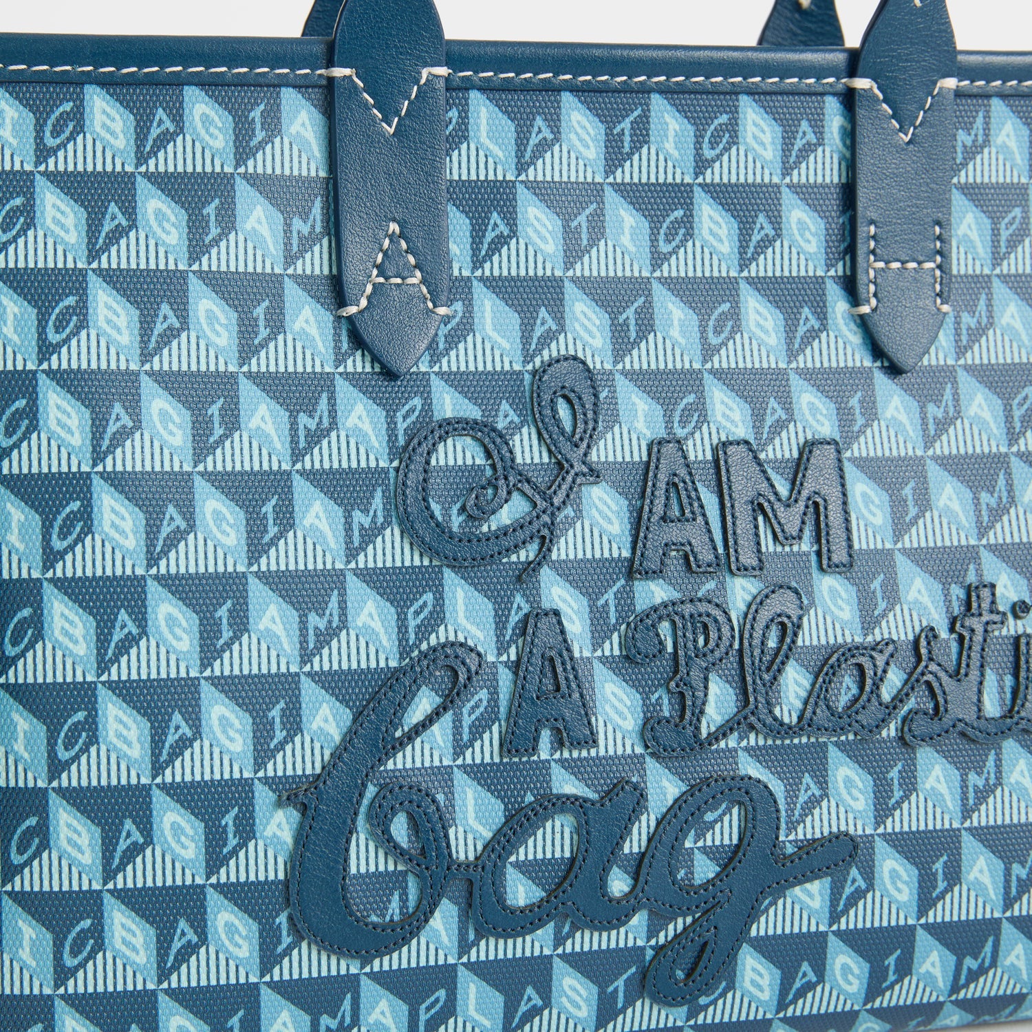 「I AM A Plastic Bag」 モチーフ・トート［XS］ -

          
            Canvas in Petrol Blue -
          

          Anya Hindmarch JP
