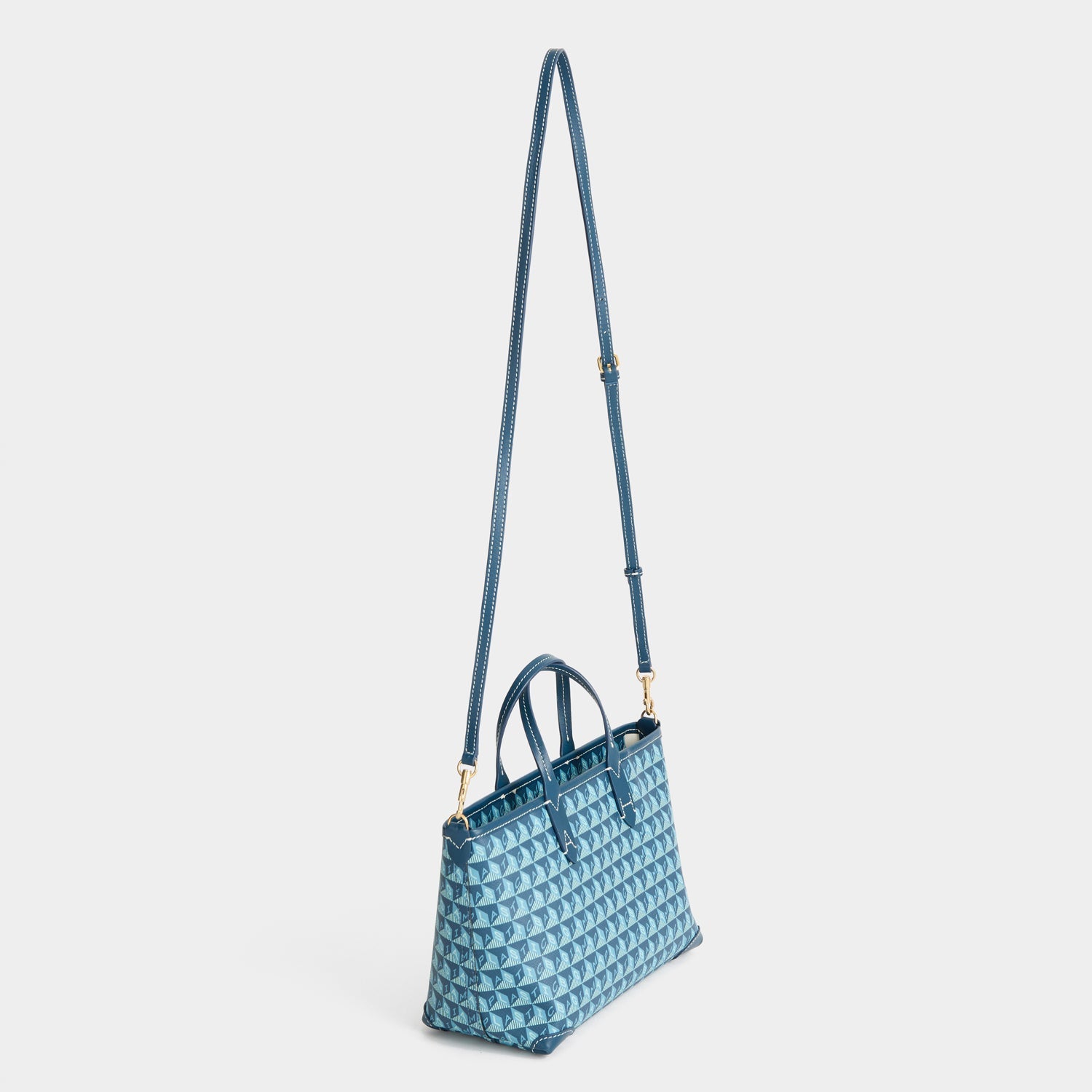 「I AM A Plastic Bag」 モチーフ・トート［XS］ -

          
            Canvas in Petrol Blue -
          

          Anya Hindmarch JP
