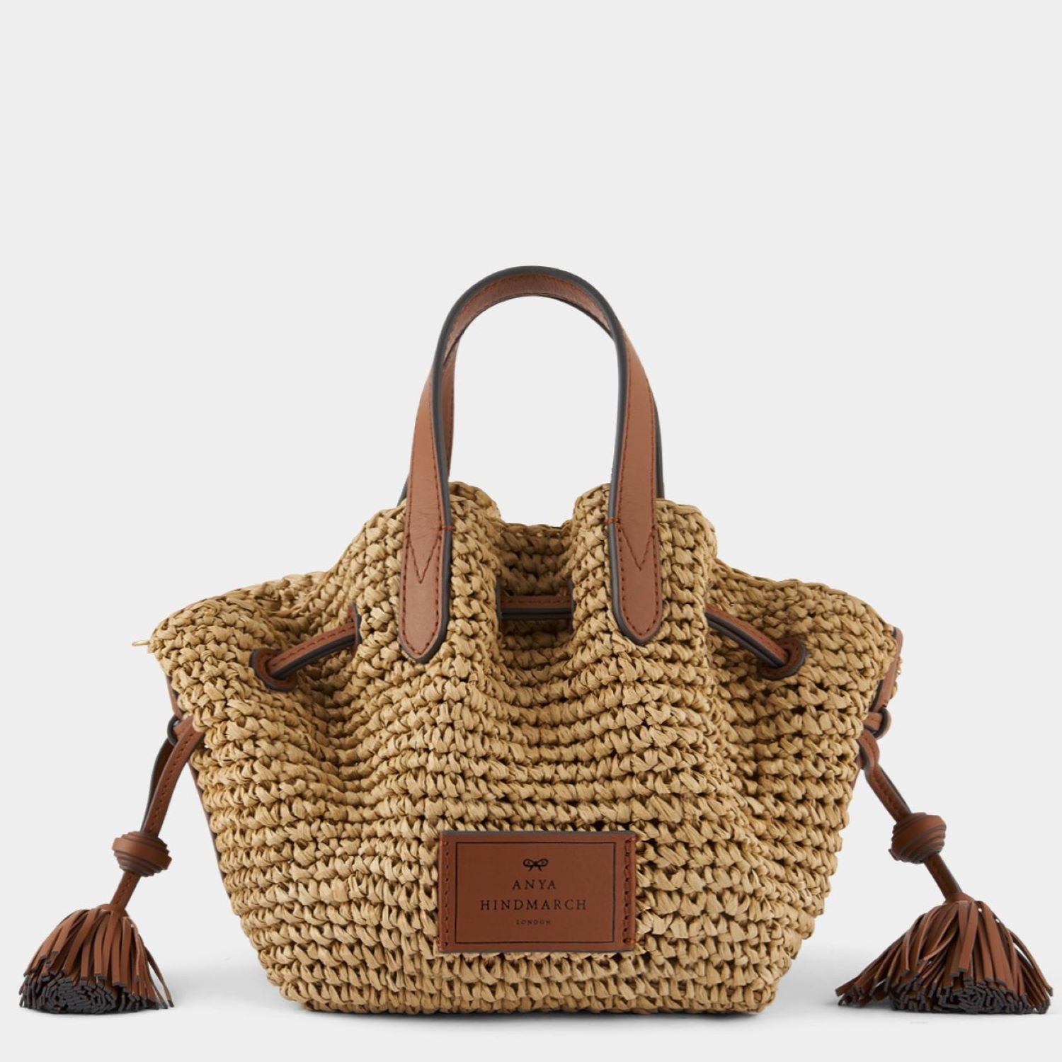 スモール ドローストリング トート -

                  
                    Raffia in Natural with Tan -
                  

                  Anya Hindmarch JP
