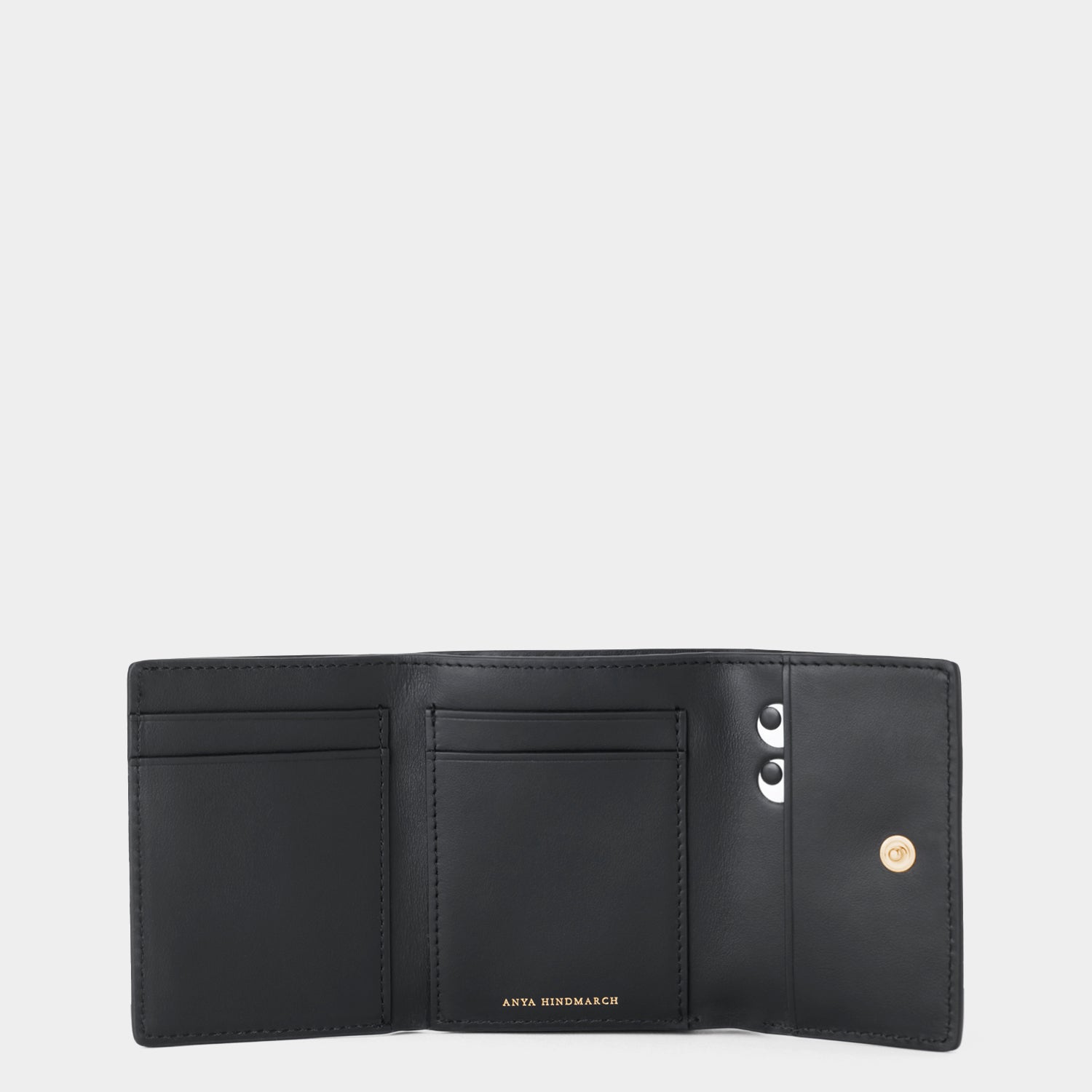 Peeping Eyes ミニ・トライフォールド・ウォレット -

          
            Shiny Capra in Black -
          

          Anya Hindmarch JP
