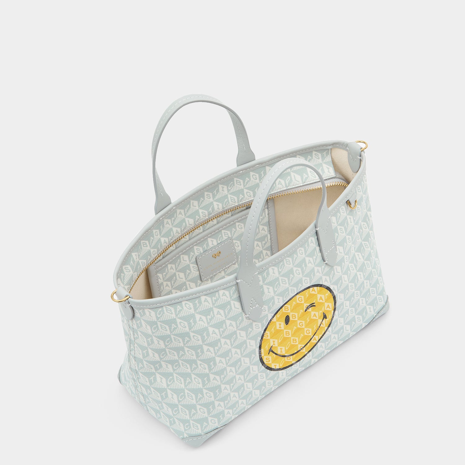 「I AM A Plastic Bag」ウィンク・ジップ・トート［XS］ -

          
            Recycled Coated Canvas in Frost -
          

          Anya Hindmarch JP
