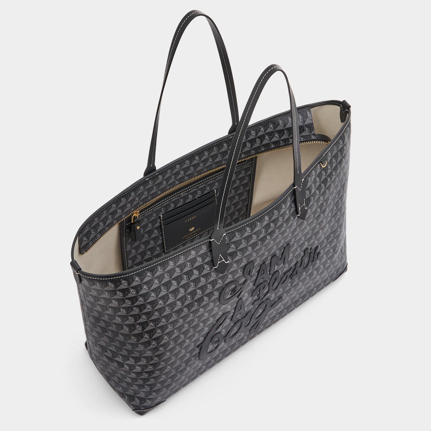 「I AM A Plastic Bag」 モチーフ・ジップ・トート -

          
            Recycled Coated Canvas in Black -
          

          Anya Hindmarch JP
