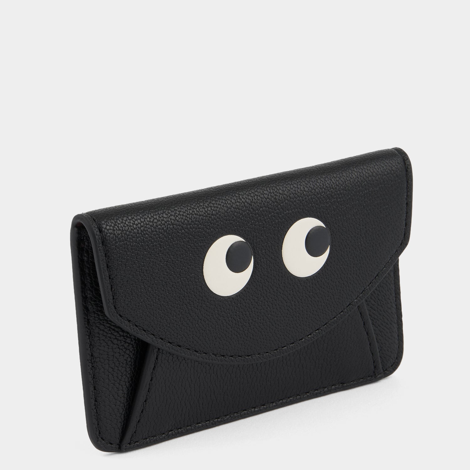 Eyes エンベロープ・カードケース［MagSafe対応］ -

          
            Shiny Capra in Black -
          

          Anya Hindmarch JP
