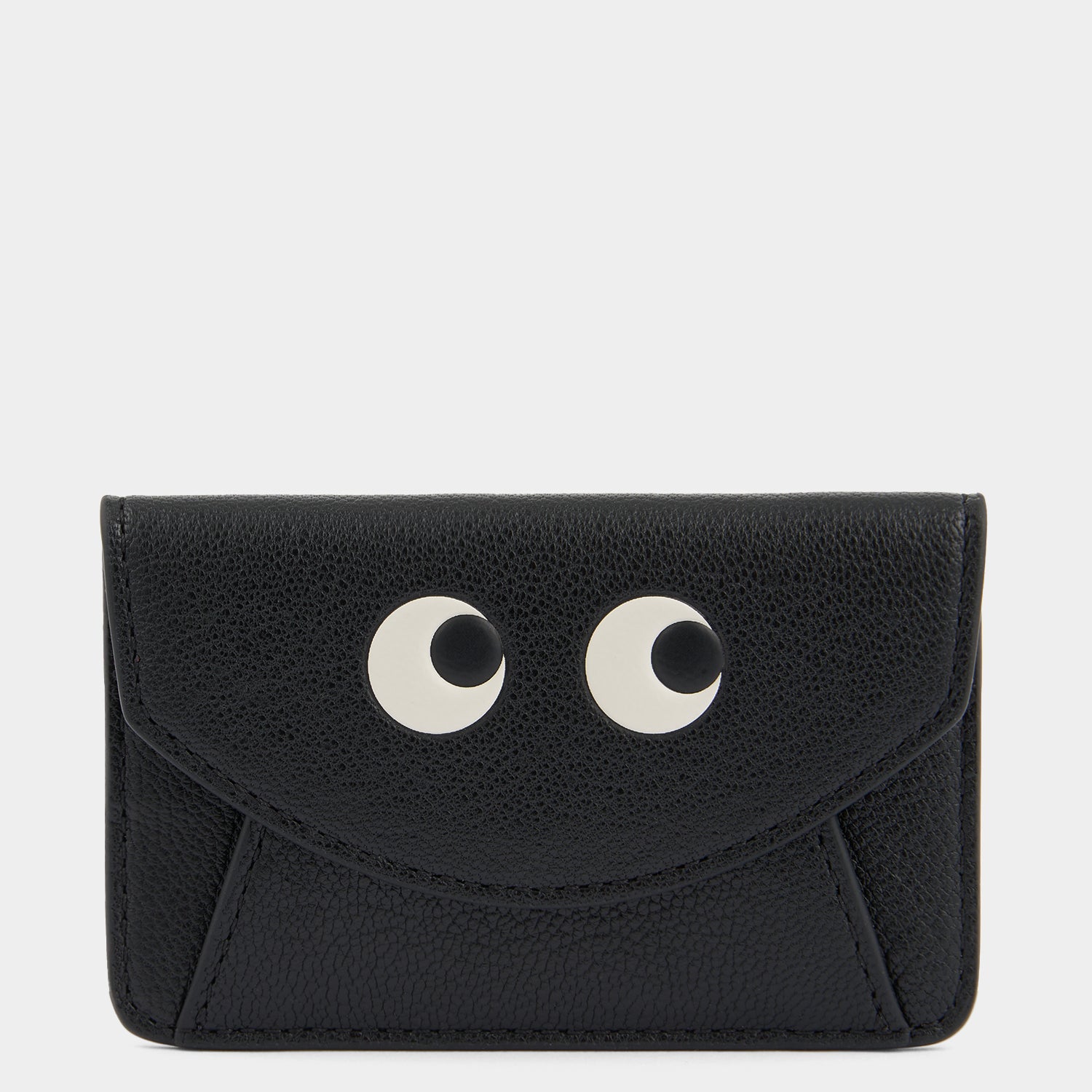 Eyes エンベロープ・カードケース［MagSafe対応］ -

          
            Shiny Capra in Black -
          

          Anya Hindmarch JP
