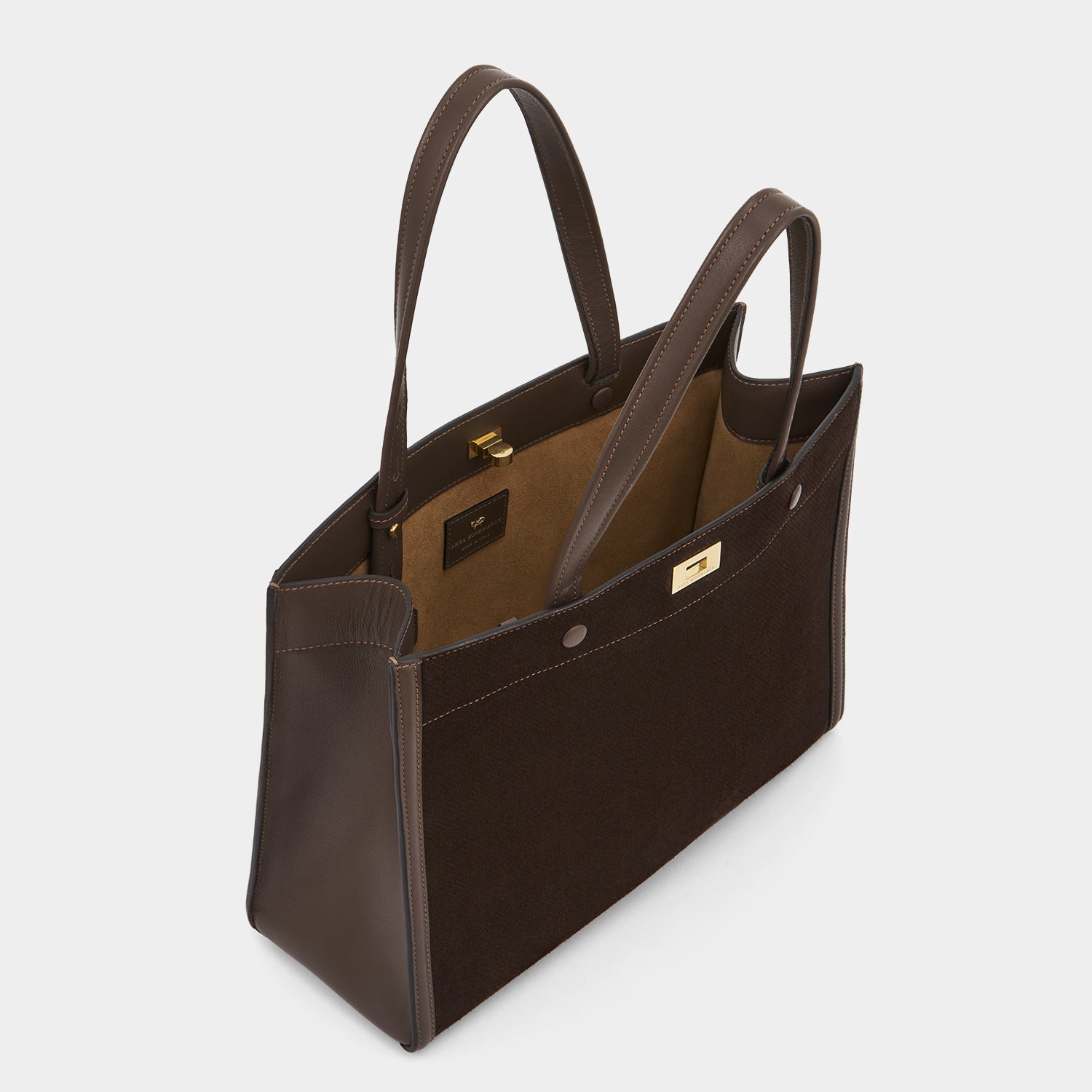 Mortimer：モティマー・パーフォレイテッド・スモール・トート -

          
            Smooth Leather in Truffle Brown -
          

          Anya Hindmarch JP
