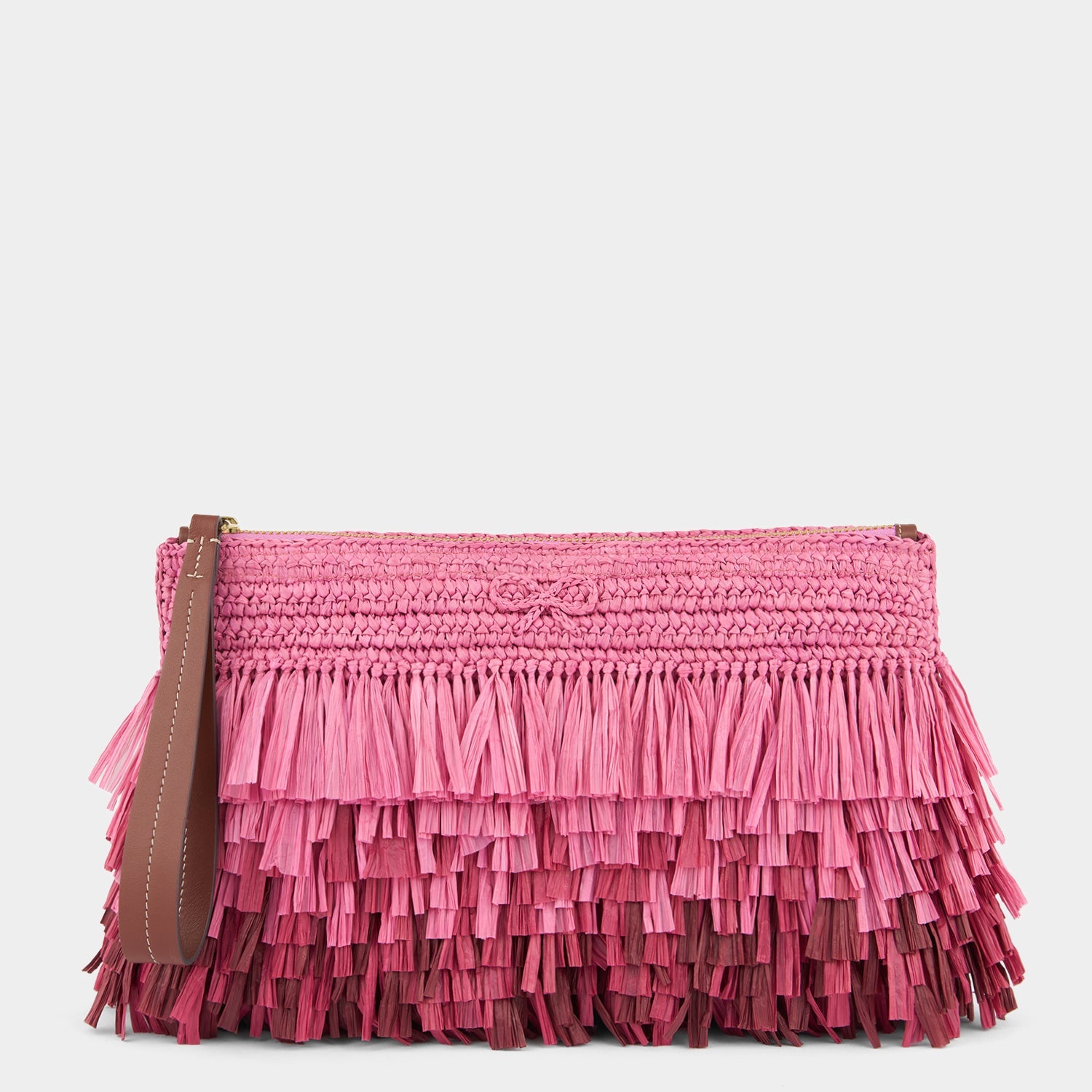 Pink raffia clutch by Anya Hindmarch
