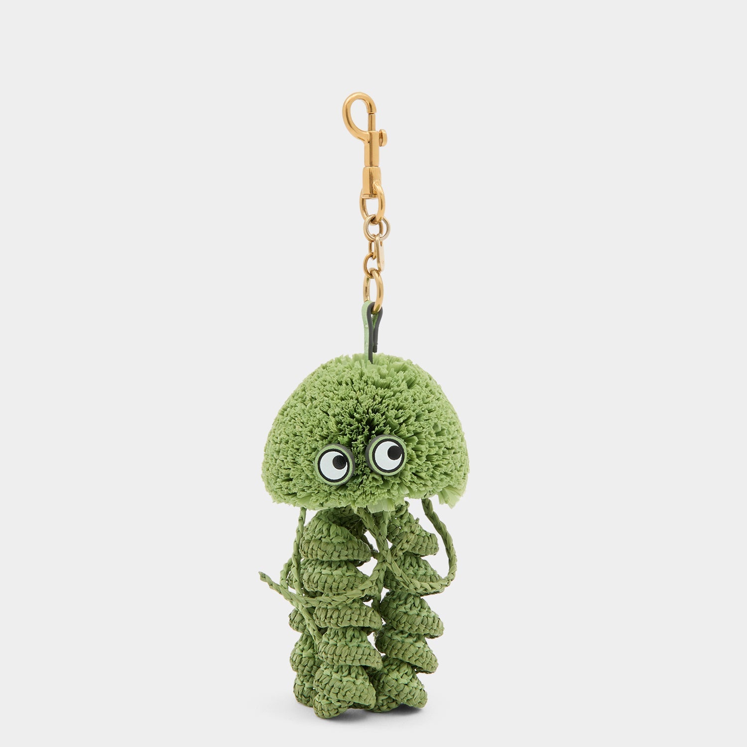 Green jellyfish charm made of raffia by Anya Hindmarch