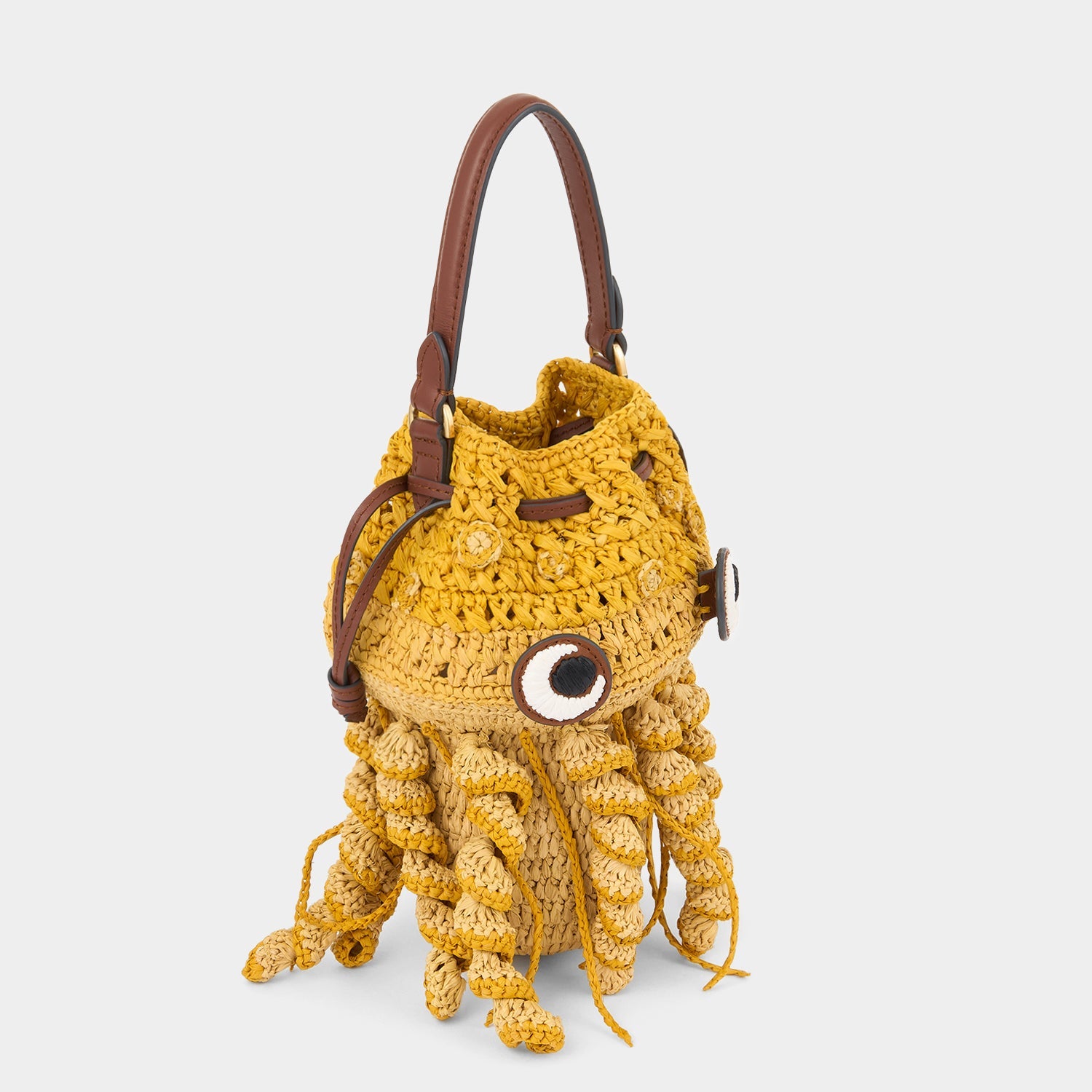 Hanwoven crossbody Jellyfish bag in  Raffia with Smooth Eco Leather made by anya hindmarch