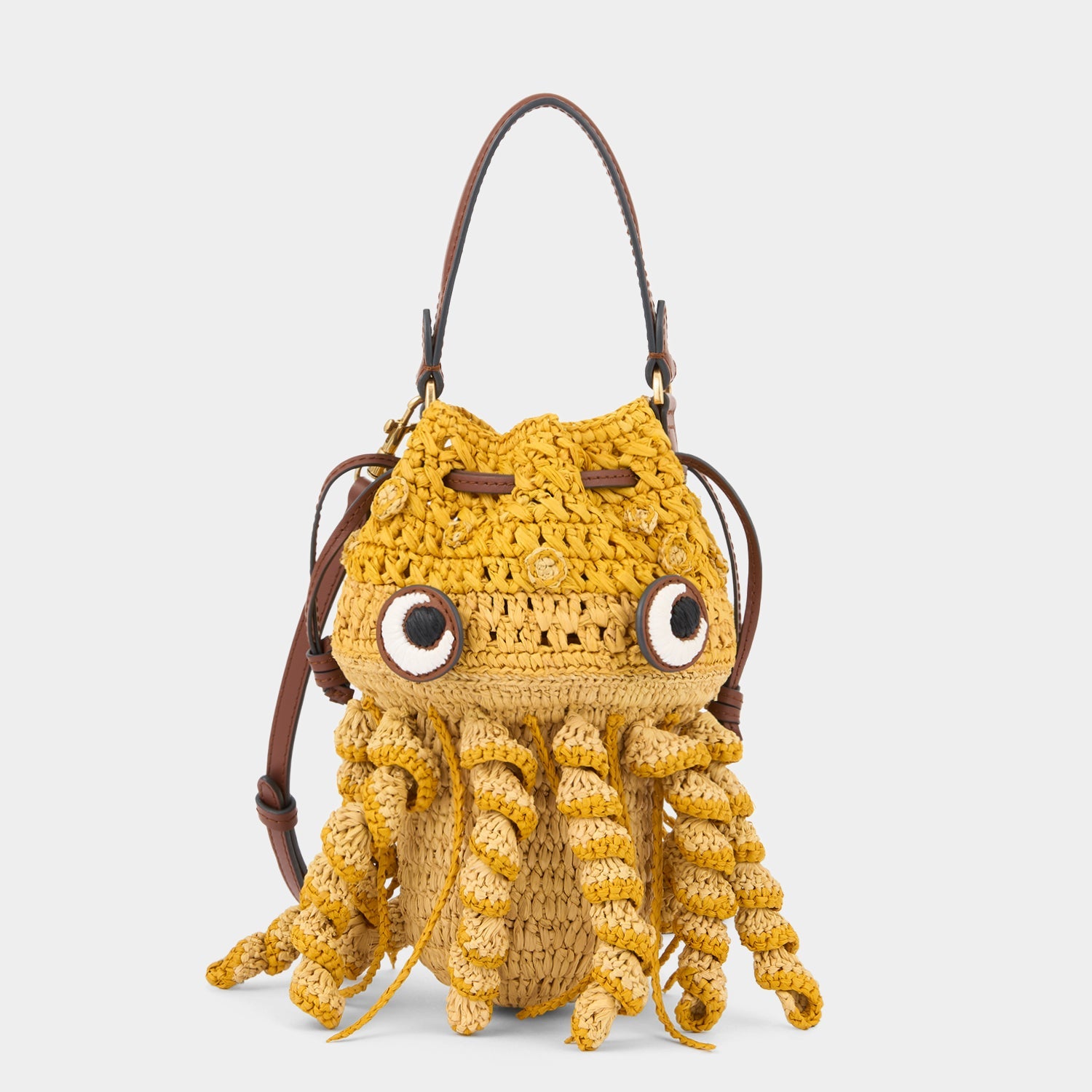 Hanwoven crossbody Jellyfish bag in  Raffia with Smooth Eco Leather made by anya hindmarch