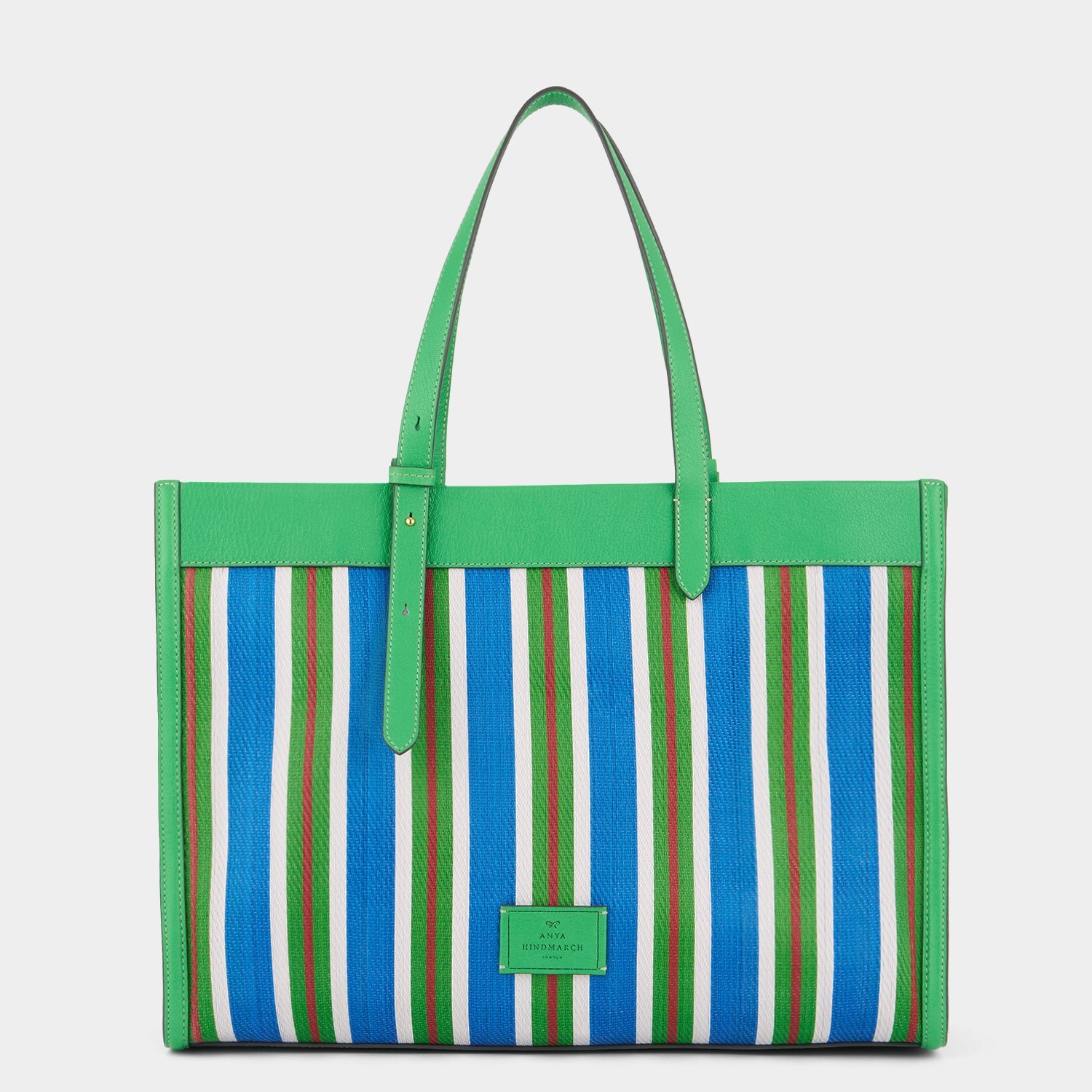 Striped tote bag with eyes made using recycled plastic by Anya Hindmarch