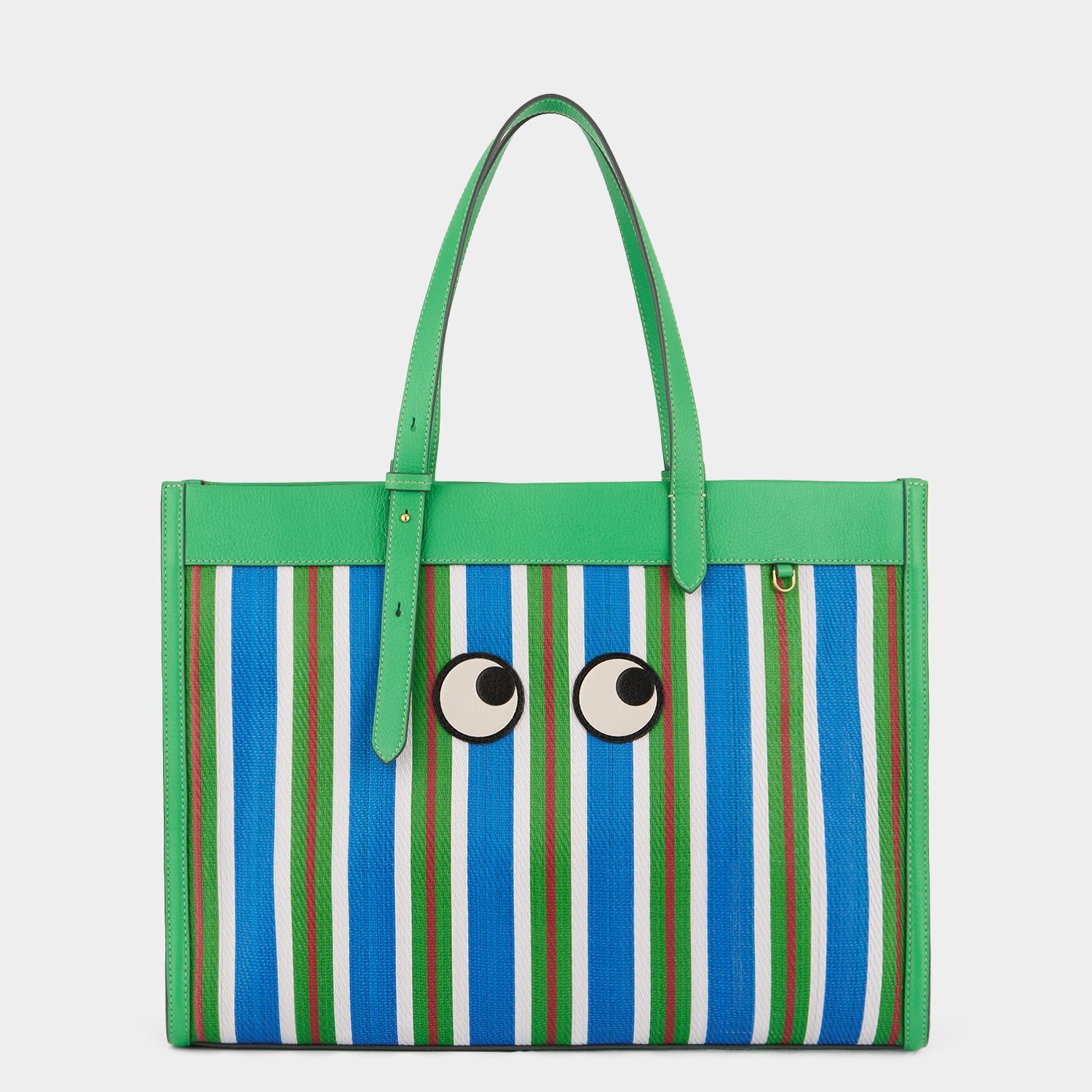 Striped tote bag with eyes made using recycled plastic by Anya Hindmarch