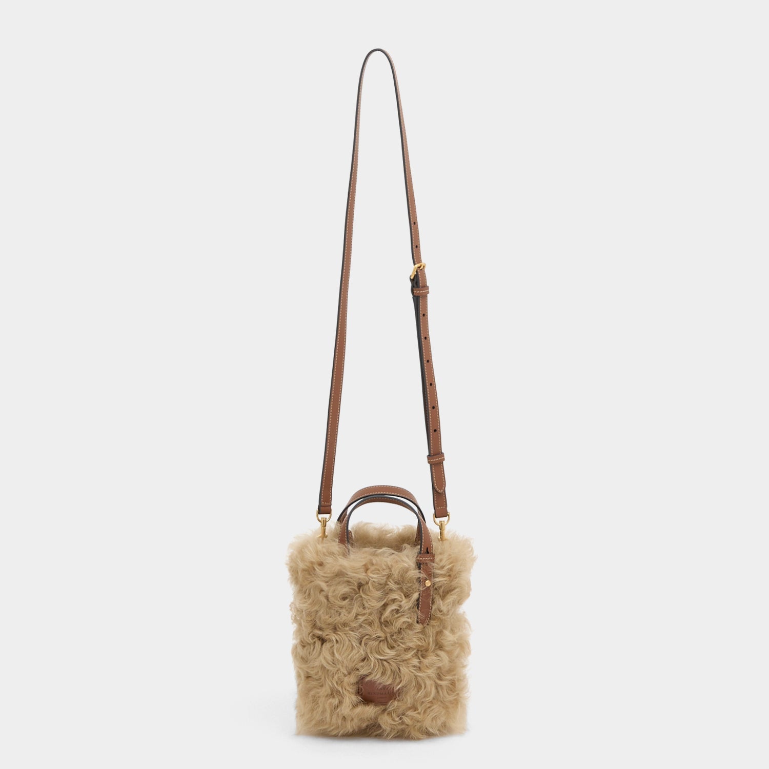 Eyes N/S シアリング・ミニ・トート -

          
            Shearling/Smooth Leather in Taupe -
          

          Anya Hindmarch JP

