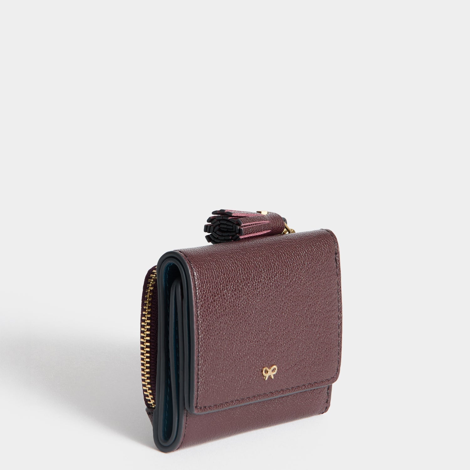 Peeping Eyes Mini Trifold Wallet -

          
            Capra Leather in Claret -
          

          Anya Hindmarch JP
