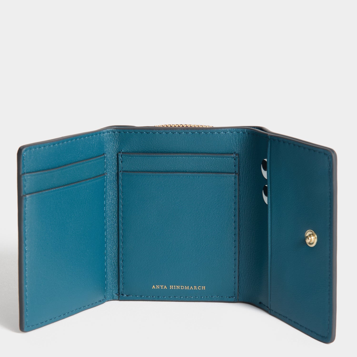 Peeping Eyes Mini Trifold Wallet -

          
            Capra Leather in Claret -
          

          Anya Hindmarch JP
