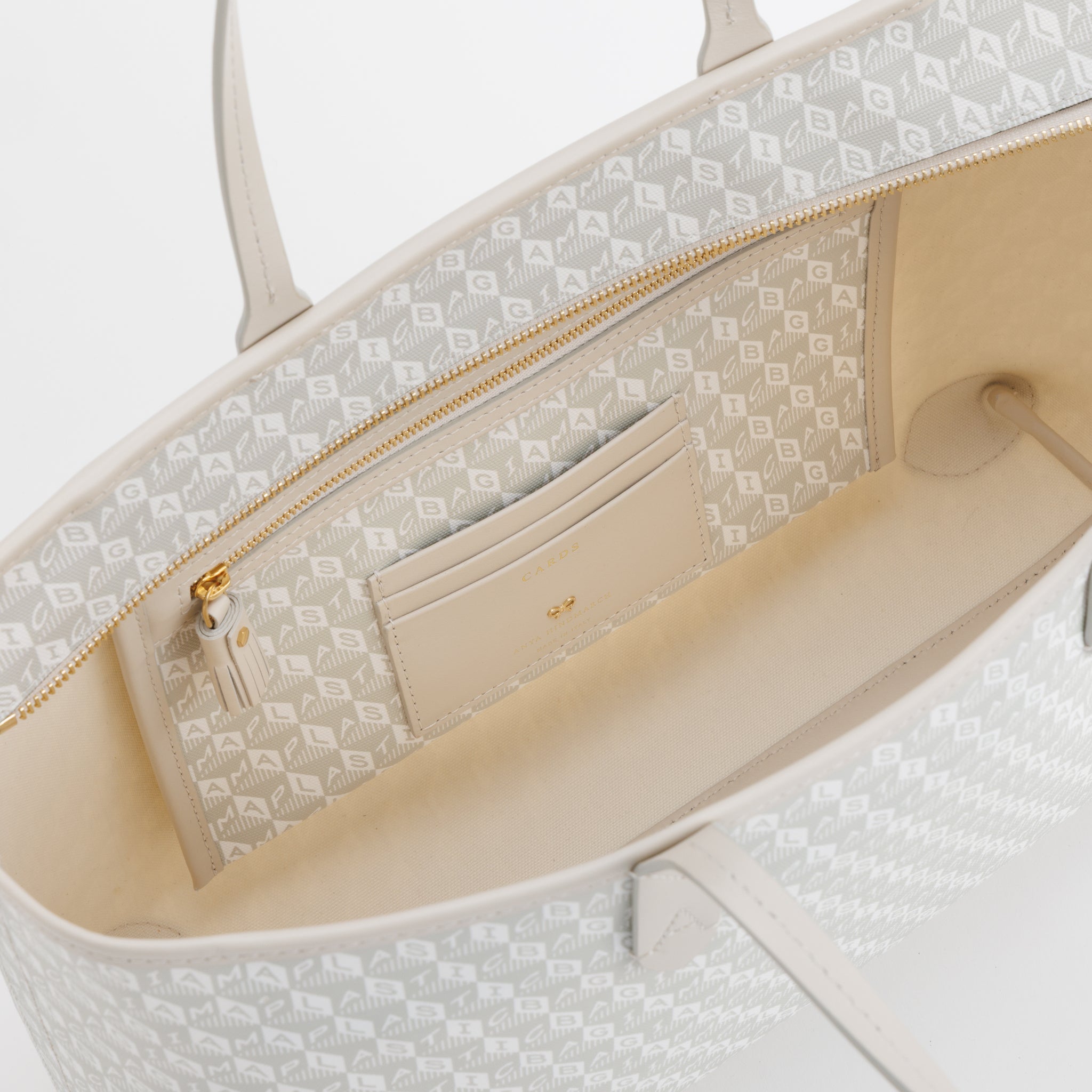I AM A Plastic Bag」スモール・ジップ・トート | Anya Hindmarch JP