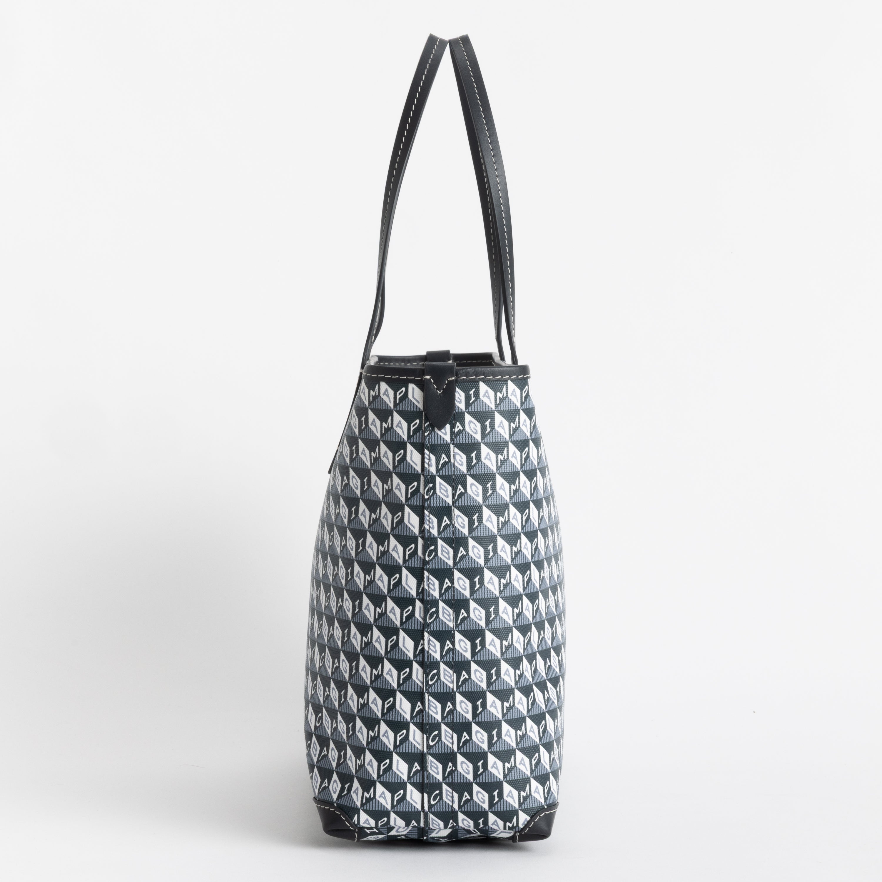 I AM A Plastic Bag」スモール・ジップ・トート | Anya Hindmarch JP