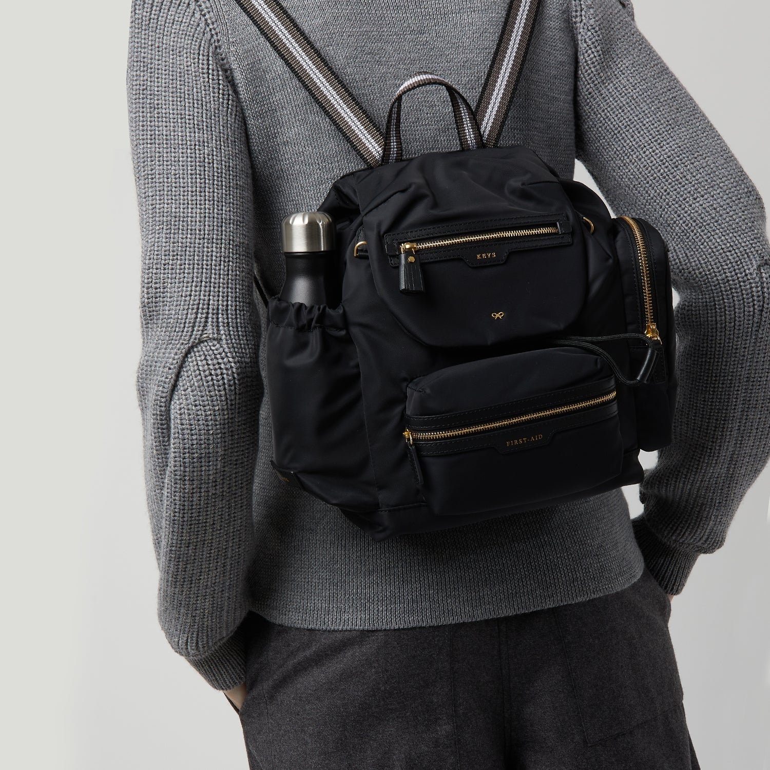 Walking Backpack -

                  
                    Recycled Nylon in Black -
                  

                  Anya Hindmarch JP
