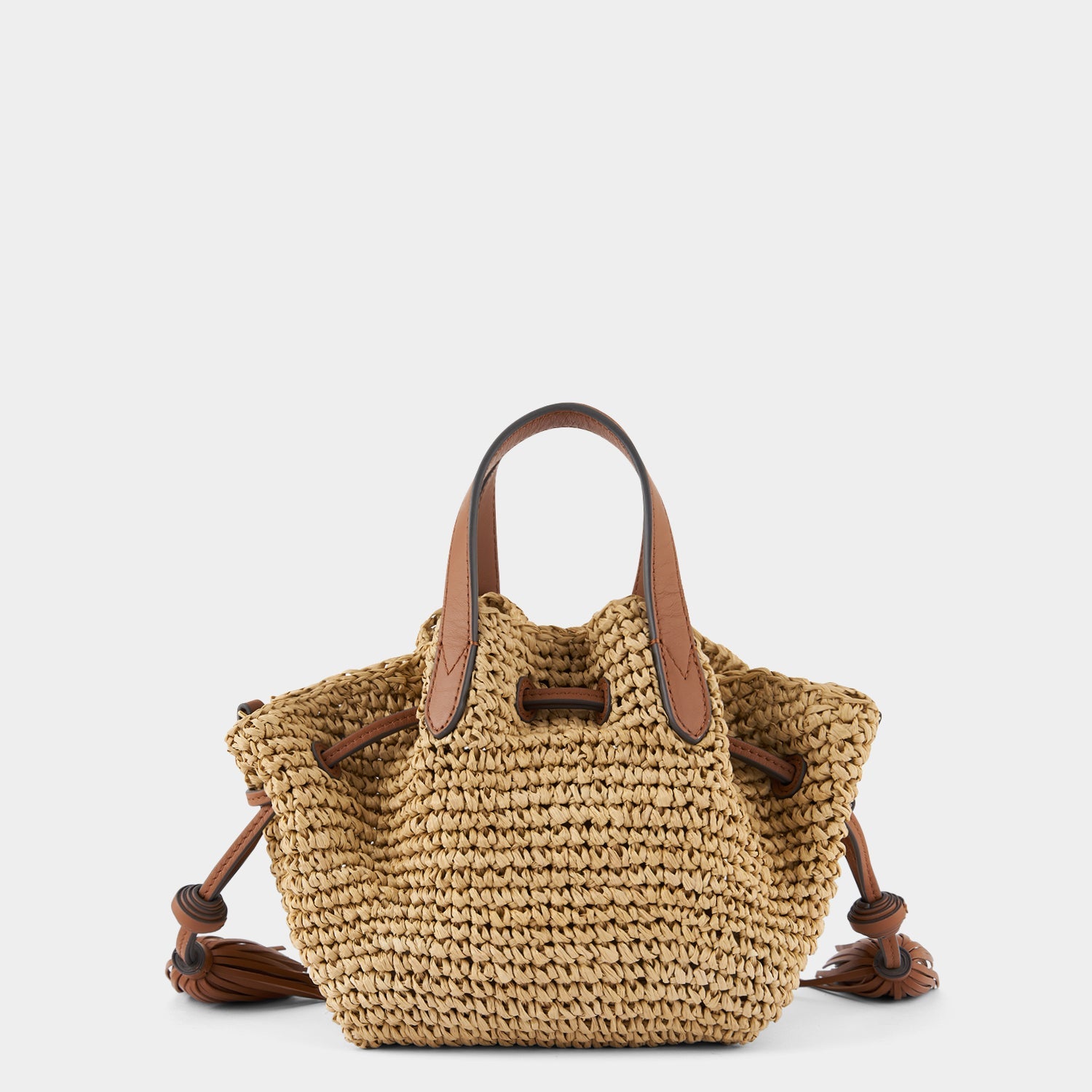 スモール ドローストリング トート -

                  
                    Raffia in Natural with Tan -
                  

                  Anya Hindmarch JP
