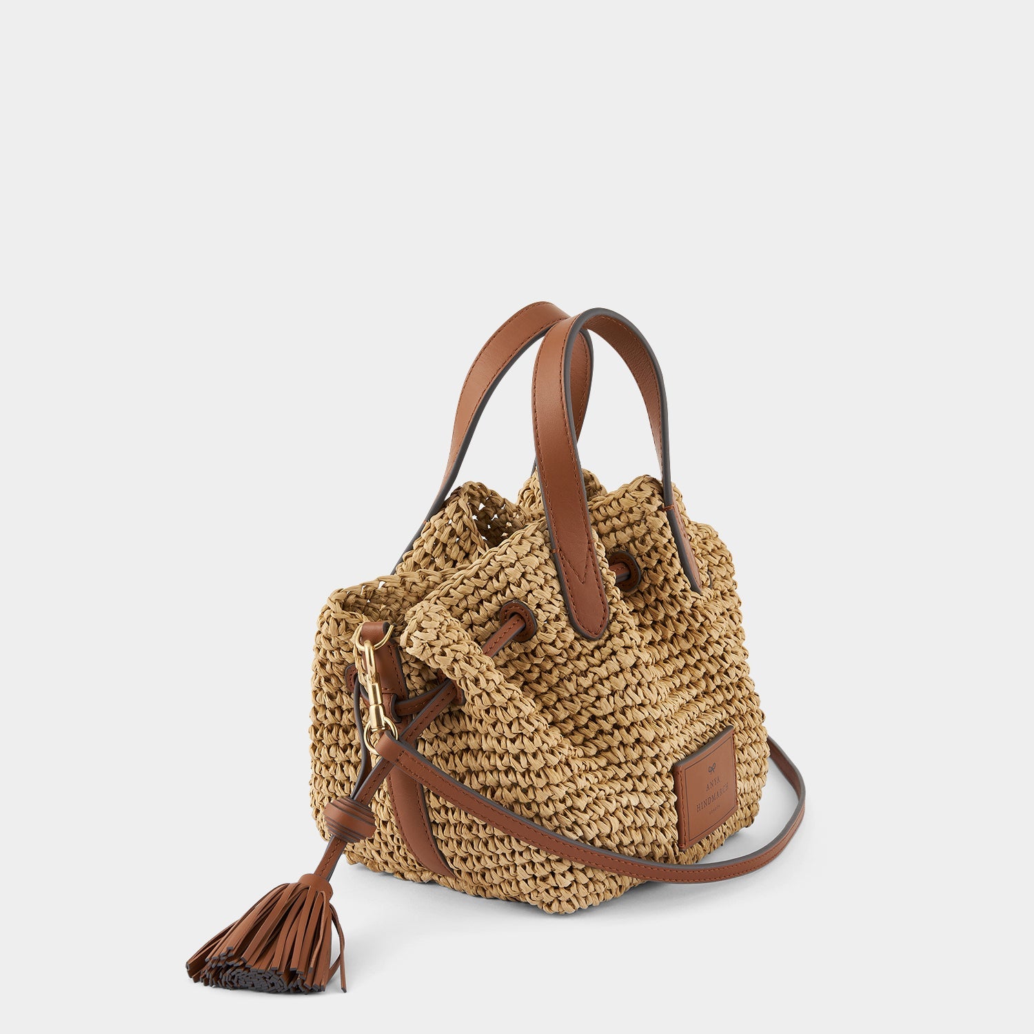 スモール ドローストリング トート -

                  
                    Raffia in Natural with Tan -
                  

                  Anya Hindmarch JP
