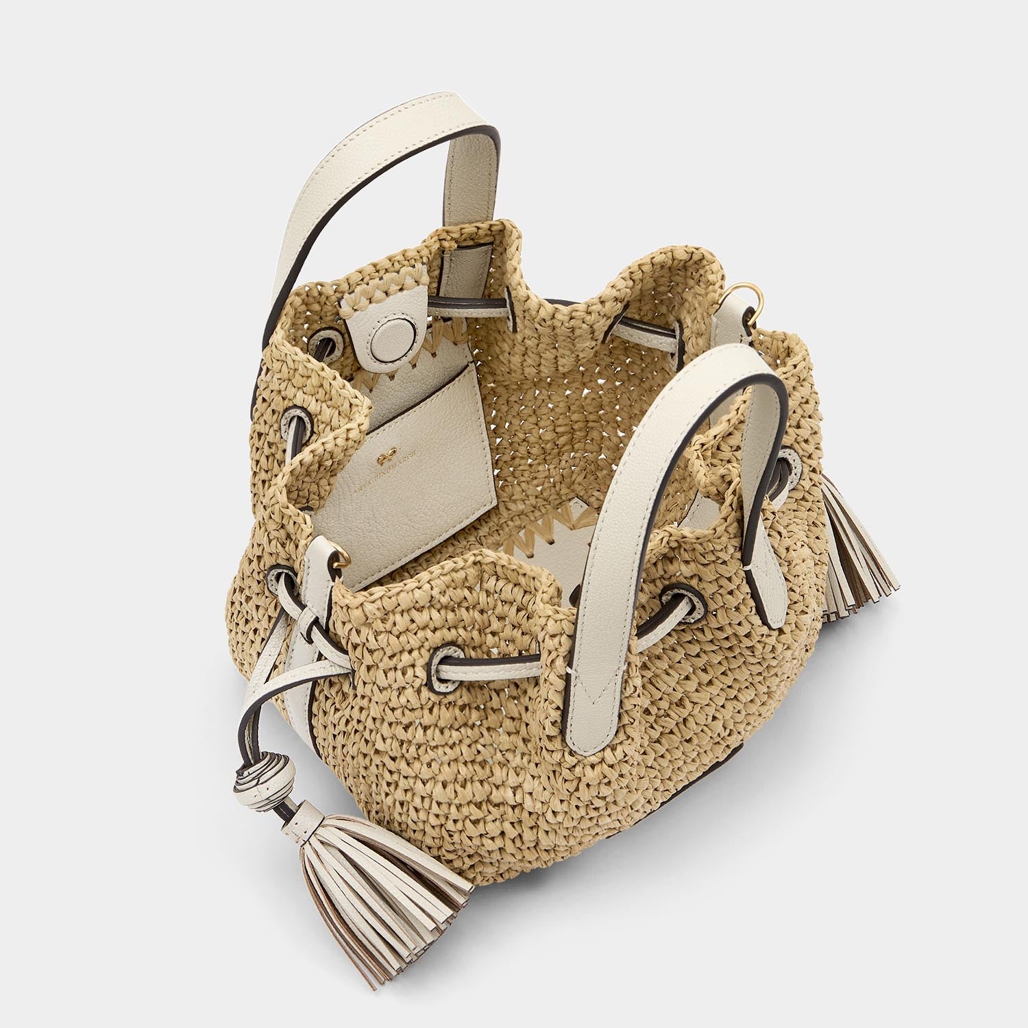 スモール ドローストリング トート -

                  
                    Raffia in Natural with Chalk -
                  

                  Anya Hindmarch JP
