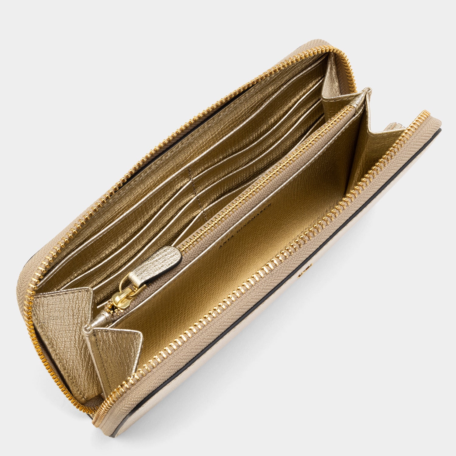 ラージ ジップ ラウンド ウォレット -

                  
                    Metallic Capra in Pale Gold -
                  

                  Anya Hindmarch JP

