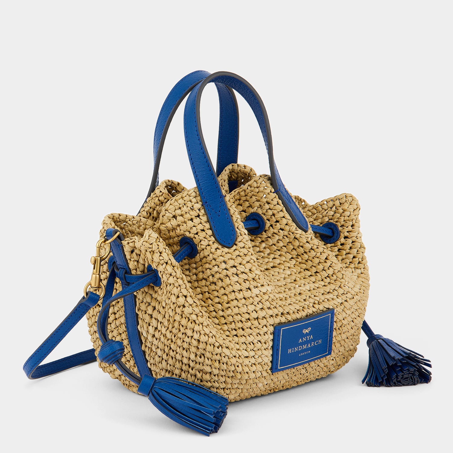 スモール ドローストリング トート -

                  
                    Raffia in Natural with Electric Blue -
                  

                  Anya Hindmarch JP
