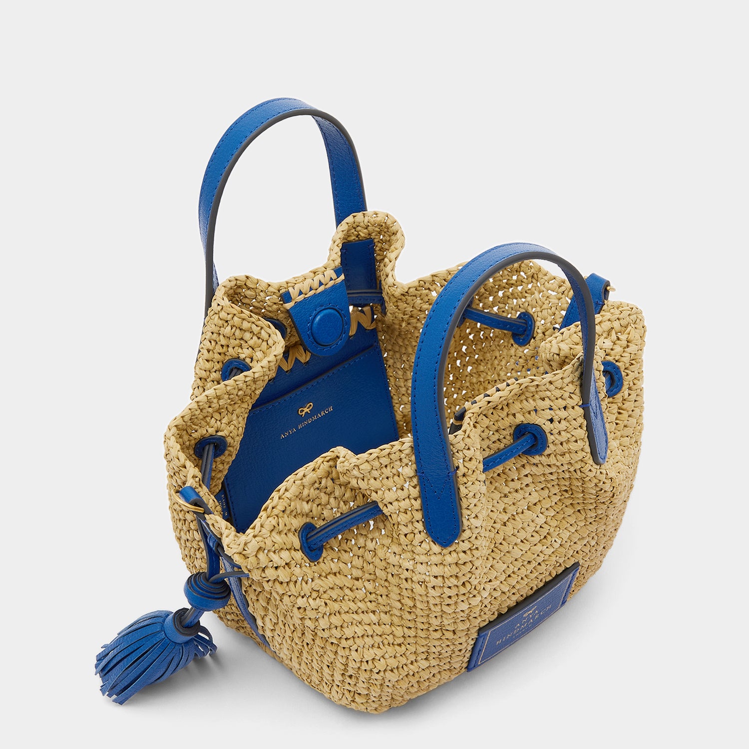 スモール ドローストリング トート -

                  
                    Raffia in Natural with Electric Blue -
                  

                  Anya Hindmarch JP
